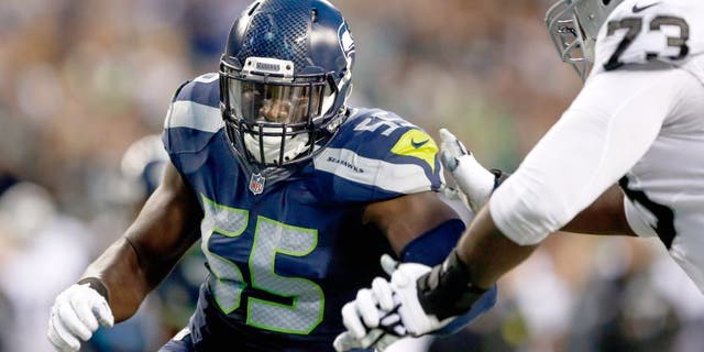 Sep 3, 2015; Seattle, WA, USA; Seattle Seahawks defensive end Frank Clark (55) rushes the passer against the Oakland Raiders during the second quarter at CenturyLink Field. Mandatory Credit: Joe Nicholson-USA TODAY Sports