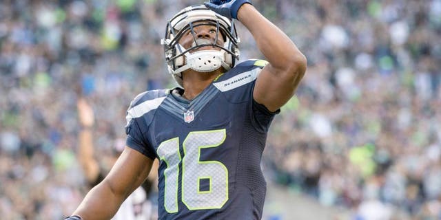 Sep 3, 2015; Seattle, WA, USA; Seattle Seahawks wide receiver Tyler Lockett (16) celebrates after scoring a touchdown on a pass reception during the first quarter at CenturyLink Field. Mandatory Credit: Troy Wayrynen-USA TODAY Sports