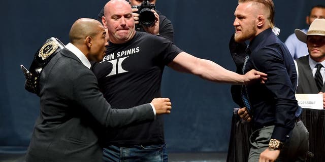 LAS VEGAS, NV - SEPTEMBER 04: (L-R) UFC featherweight champion Jose Aldo and featherweight interim champion Conor McGregor face offduring the UFC's Go Big launch event inside MGM Grand Garden Arena on September 4, 2015 in Las Vegas, Nevada. (Photo by Josh Hedges/Zuffa LLC/Zuffa LLC via Getty Images)