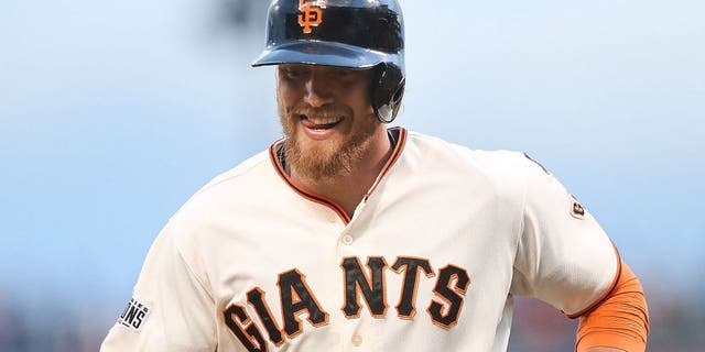 SAN FRANCISCO, CA - MAY 19: Hunter Pence #8 of the San Francisco Giants heads back to the dugout after striking out in the bottom of the second inning against the Los Angeles Dodgers at AT&amp;T Park on May 19, 2015 in San Francisco, California. The Giants swept the NL West leaders during the last homestand in San Francisco. (Photo by Don Feria/Getty Images)