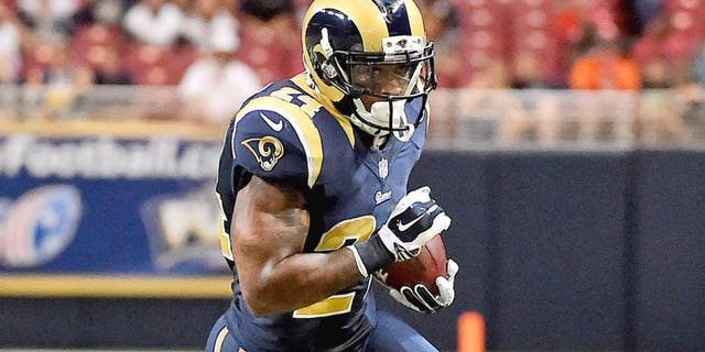 Sep 3, 2015; St. Louis, MO, USA; St. Louis Rams running back Isaiah Pead (24) runs the ball against the Kansas City Chiefs during the first half at the Edward Jones Dome. Mandatory Credit: Jasen Vinlove-USA TODAY Sports