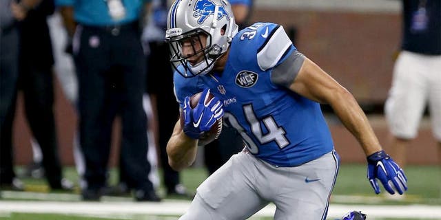 DETROIT, MI - AUGUST 13: Running Back Zach Zenner #34 of the Detroit Lions has a long gain against the New York Jets at Ford Field on August 13, 2015 in Detroit, Michigan. (Photo by Al Pereira/Getty Images for New York Jets)