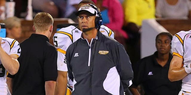 Aug 30, 2014; Starkville, MS, USA; Southern Miss Golden Eagles head coach Todd Monken during the game against the Mississippi State Bulldogs at Davis Wade Stadium. Mandatory Credit: Spruce Derden-USA TODAY Sports