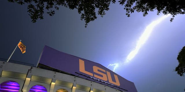 BATON ROUGE, LA - SEPTEMBER 05: Lightning strikes outside of Tiger Stadium during a weather delay between the LSU Tigers and the McNeese State Cowboys on September 5, 2015 in Baton Rouge, Louisiana. (Photo by Stacy Revere/Getty Images)