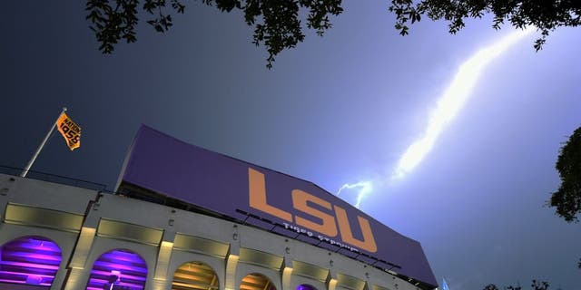 BATON ROUGE, LA - SEPTEMBER 05: Lightning strikes outside of Tiger Stadium during a weather delay between the LSU Tigers and the McNeese State Cowboys on September 5, 2015 in Baton Rouge, Louisiana. (Photo by Stacy Revere/Getty Images)