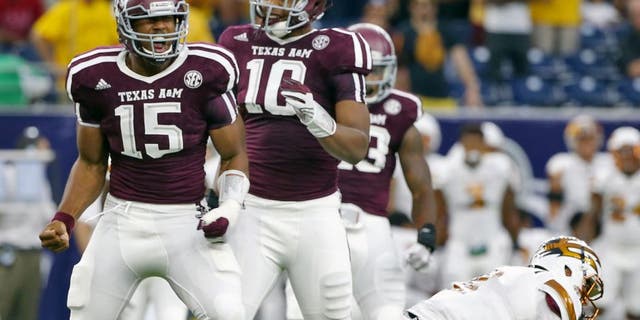 HOUSTON, TX - SEPTEMBER 05: Myles Garrett #15 of the Texas A&M Aggies celebrates after his sack of Mike Bercovici #2 of the Arizona State Sun Devils during the first half of their game during the Advocare Texas Kickoff at NRG Stadium on September 5, 2015 in Houston, Texas. (Photo by Scott Halleran/Getty Images)