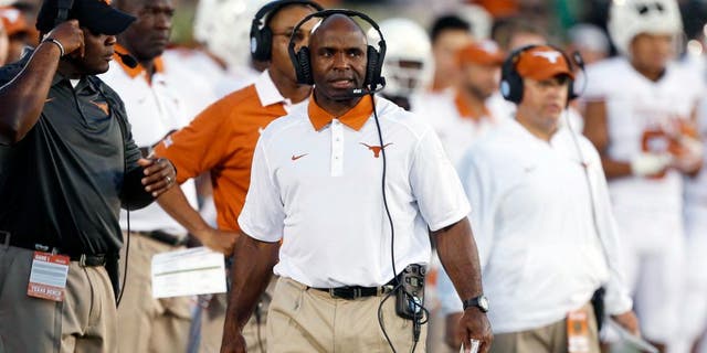 Sep 5, 2015; South Bend, IN, USA; Texas Longhorns coach Charlie Strong coaches on the sidelines against the Notre Dame Fighting Irish at Notre Dame Stadium. Mandatory Credit: Brian Spurlock-USA TODAY Sports