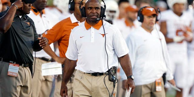 Sep 5, 2015; South Bend, IN, USA; Texas Longhorns coach Charlie Strong coaches on the sidelines against the Notre Dame Fighting Irish at Notre Dame Stadium. Mandatory Credit: Brian Spurlock-USA TODAY Sports