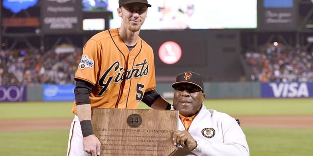 SAN FRANCISCO, CA - OCTOBER 02: Matt Duffy #5 of the San Francisco Giants, this year's recepient of the Willie Mac Award, stands with the former Giants great Willie McCovey prior to the game against the Colorado Rockies at AT&amp;T Park on October 2, 2015 in San Francisco, California. (Photo by Thearon W. Henderson/Getty Images)