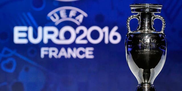 The trophy of the Euro 2016 is seen before the UEFA Euro 2016 qualifying draw in Nice, February 23, 2014. The 53 teams will be split into eight groups of six and one group of five. The top two sides in each group plus the best third-placed team will qualify directly for Euro 2016 in France. The UEFA Euro 2016 will be held in France from June 10 to July 10 2016. REUTERS/Jean-Paul Pelissier (FRANCE - Tags: SPORT SOCCER) Picture Supplied by Action Images
