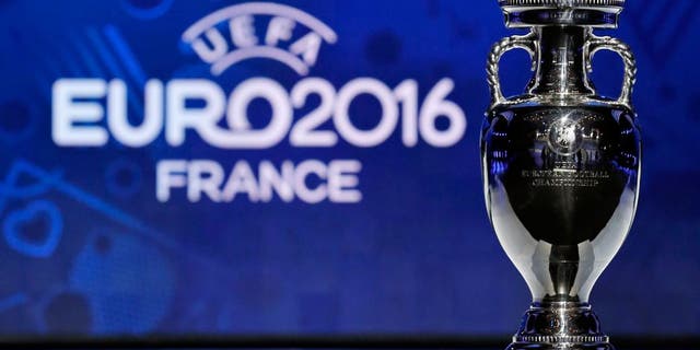 The trophy of the Euro 2016 is seen before the UEFA Euro 2016 qualifying draw in Nice, February 23, 2014. The 53 teams will be split into eight groups of six and one group of five. The top two sides in each group plus the best third-placed team will qualify directly for Euro 2016 in France. The UEFA Euro 2016 will be held in France from June 10 to July 10 2016. REUTERS/Jean-Paul Pelissier (FRANCE - Tags: SPORT SOCCER) Picture Supplied by Action Images