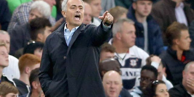 Chelsea's Portuguese manager Jose Mourinho gestures during the English Premier League football match between Chelsea and Southampton at Stamford Bridge in London on October 3, 2015. AFP PHOTO / JUSTIN TALLIS RESTRICTED TO EDITORIAL USE. No use with unauthorized audio, video, data, fixture lists, club/league logos or 'live' services. Online in-match use limited to 75 images, no video emulation. No use in betting, games or single club/league/player publications. (Photo credit should read JUSTIN TALLIS/AFP/Getty Images)
