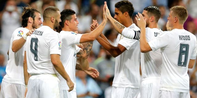 MADRID, SPAIN - AUGUST 29: The players of Real Madrid celebrate after scoring during the La Liga match between Real Madrid CF and Real Betis Balompie at Estadio Santiago Bernabeu on August 29, 2015 in Madrid, Spain. (Photo by Helios de la Rubia/Real Madrid via Getty Images)