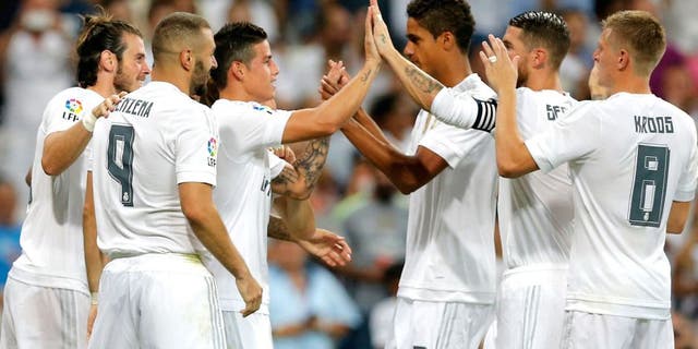 MADRID, SPAIN - AUGUST 29: The players of Real Madrid celebrate after scoring during the La Liga match between Real Madrid CF and Real Betis Balompie at Estadio Santiago Bernabeu on August 29, 2015 in Madrid, Spain. (Photo by Helios de la Rubia/Real Madrid via Getty Images)
