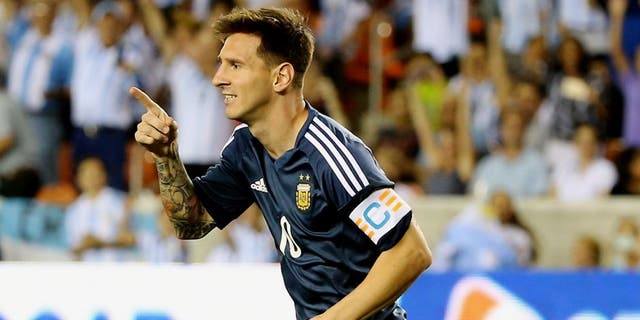 HOUSTON, TX - SEPTEMBER 04: Lionel Messi #10 of Argentina celebrates after he scores a goal past Dainel Vaca #1 of Bolivia during their international friendly match at BBVA Compass Stadium on September 4, 2015 in Houston, Texas. (Photo by Scott Halleran/Getty Images)