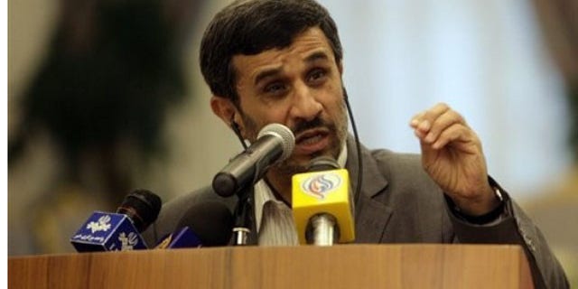 Sept. 5: Iranian President Mahmoud Ahmadinejad speaks during a joint press conference with Qatar's emir, Sheikh Hamad bin Khalifa al-Thani, unseen, at the royal palace in Doha, declaring that any attack on the Islamic republic will result in the destruction of Israel (AP).