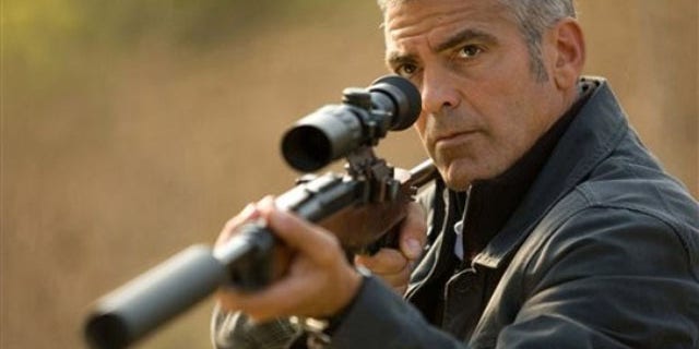 In this film publicity image released by Focus Features, George Clooney is shown in a scene from, "The American" (AP).