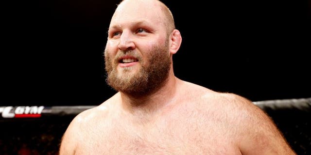 MASHANTUCKET, CT - SEPTEMBER 05: Ben Rothwell celebrates after defeating Alistair Overeem in their heavyweight bout during the UFC Fight Night event at Foxwoods Resort Casino on September 5, 2014 in Mashantucket, Connecticut. (Photo by Josh Hedges/Zuffa LLC/Zuffa LLC via Getty Images)