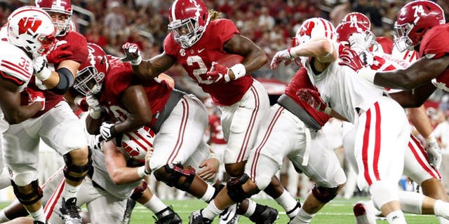 Sep 5, 2015; Arlington, TX, USA; Alabama Crimson Tide running back Derrick Henry (2) scores a touchdown against the Wisconsin Badgers during the third quarter at AT&T Stadium. Mandatory Credit: Tim Heitman-USA TODAY Sports