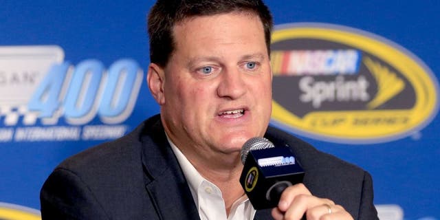BROOKLYN, MI - AUGUST 14: NASCAR Executive Vice President Steve O'Donnell speaks to the media after qualifying for the NASCAR Sprint Cup Series Pure Michigan 400 at Michigan International Speedway on August 14, 2015 in Brooklyn, Michigan. (Photo by Chris Trotman/Getty Images)