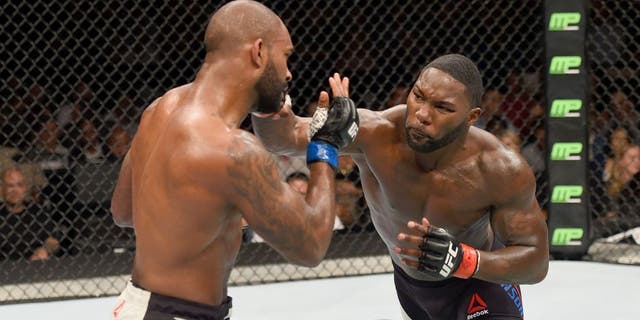 LAS VEGAS, NV - SEPTEMBER 05: (R-L) Anthony Johnson punches Jimi Manuwa in their light heavyweight bout during the UFC 191 event inside MGM Grand Garden Arena on September 5, 2015 in Las Vegas, Nevada. (Photo by Josh Hedges/Zuffa LLC/Zuffa LLC via Getty Images)