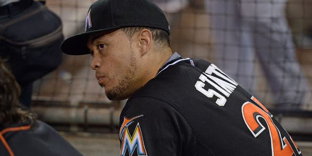 Jul 25, 2015; San Diego, CA, USA; Miami Marlins right fielder Giancarlo Stanton (27) watches game action during the ninth inning against the San Diego Padres at Petco Park. Mandatory Credit: Jake Roth-USA TODAY Sports