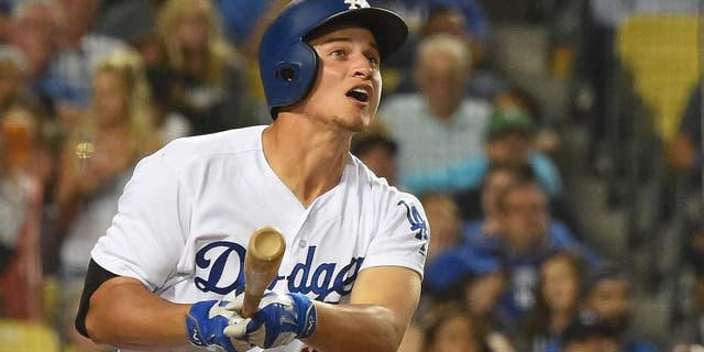 LOS ANGELES, CA - AUGUST 08: Corey Seager #5 of the Los Angeles Dodgers connects for his second home run of the game in the seventh inning against the Philadelphia Phillies at Dodger Stadium on August 8, 2016 in Los Angeles, California. (Photo by Jayne Kamin-Oncea/Getty Images)