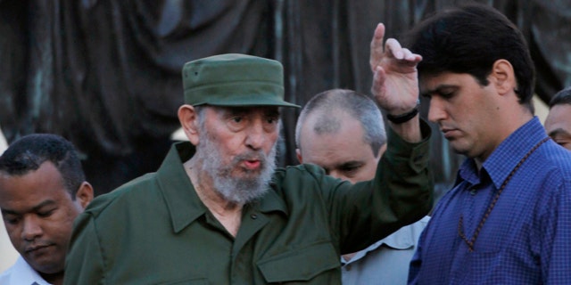 Sept. 3: Cuba's leader Fidel Castro greets students before delivering a speech outside Havana's University in Havana, Cuba.