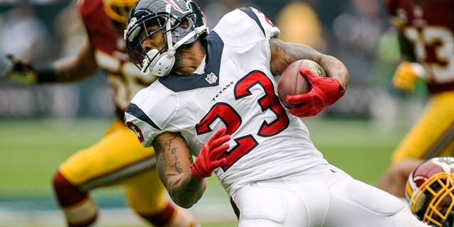 Sep 7, 2014; Houston, TX, USA; Houston Texans running back Arian Foster (23) runs with the ball during the first quarter against the Washington Redskins at NRG Stadium. Mandatory Credit: Troy Taormina-USA TODAY Sports
