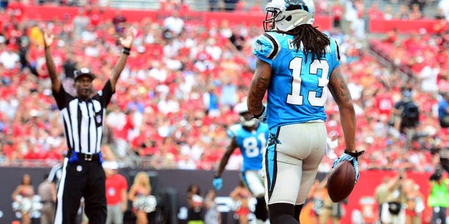 Sep 7, 2014; Tampa, FL, USA; Carolina Panthers wide receiver Kelvin Benjamin (13) makes a catch in the end zone for a touchdown during the fourth quarter against the Tampa Bay Buccaneers at Raymond James Stadium. Mandatory Credit: Andrew Weber-USA TODAY Sports