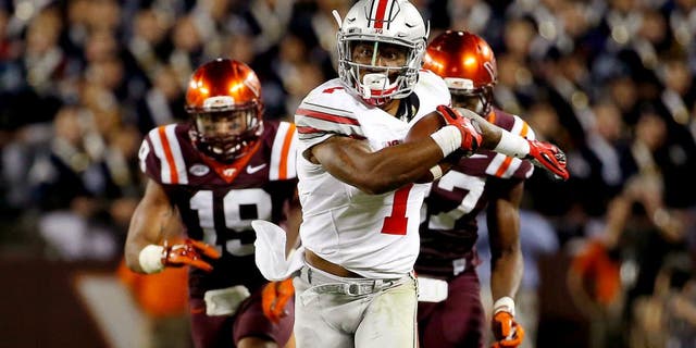 Sep 7, 2015; Blacksburg, VA, USA; Ohio State Buckeyes wide receiver Braxton Miller (1) runs for a touchdown during the third quarter against the Virginia Tech Hokies at Lane Stadium. Mandatory Credit: Peter Casey-USA TODAY Sports