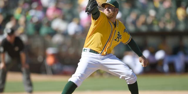 OAKLAND, CA - SEPTEMBER 06: Sean Doolittle #62 of the Oakland Athletics pitches against the Seattle Mariners in the top of the ninth inning at O.co Coliseum on September 6, 2015 in Oakland, California. (Photo by Thearon W. Henderson/Getty Images)