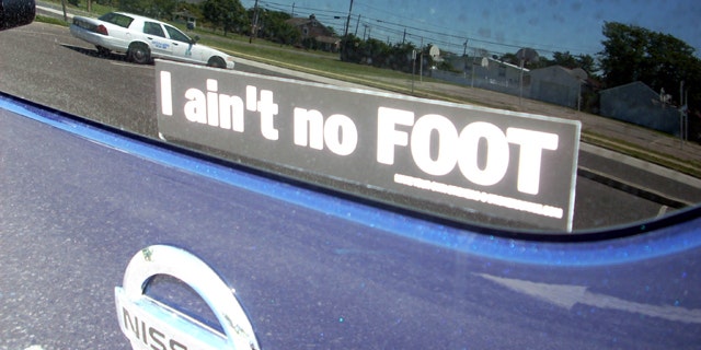 This Aug. 27, 2010 photo taken in Brigantine, N.J., shows a bumper sticker saying "I Ain't No FOOT," which according to a Facebook page is an acronym for "Out of Towners" preceded by an obscenity.