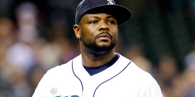Jun 14, 2014; Seattle, WA, USA; Seattle Mariners relief pitcher Fernando Rodney (56) during the game against the Texas Rangers at Safeco Field. Texas defeated Seattle 4-3. Mandatory Credit: Steven Bisig-USA TODAY Sports