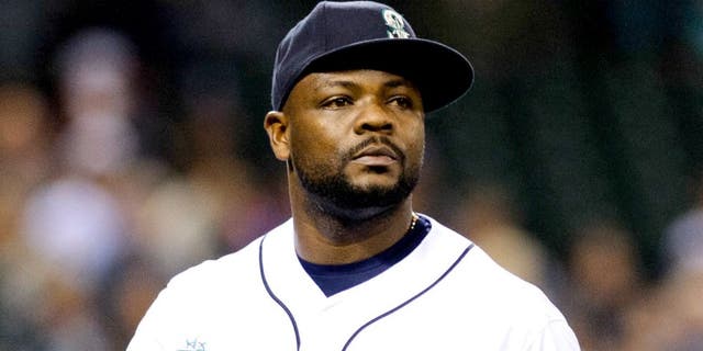 Jun 14, 2014; Seattle, WA, USA; Seattle Mariners relief pitcher Fernando Rodney (56) during the game against the Texas Rangers at Safeco Field. Texas defeated Seattle 4-3. Mandatory Credit: Steven Bisig-USA TODAY Sports