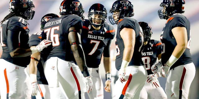 Sep 6, 2014; El Paso, TX, USA; Texas Tech Red Raiders quarterback Davis Webb (7) calls a play to his offense as they face the UTEP Miners defense at Sun Bowl Stadium. Mandatory Credit: Ivan Pierre Aguirre-USA TODAY Sports