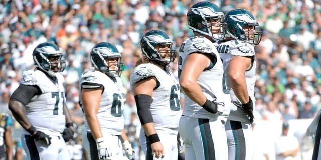 Sep 7, 2014; Philadelphia, PA, USA; Philadelphia Eagles tackle Jason Peters (71), center David Molk (63), center Jason Kelce (62), guard Todd Herremans (79) and tackle Andrew Gardner (66) during game against the Jacksonville Jaguars at Lincoln Financial Field. The Eagles defeated the Jaguars, 34-17. Mandatory Credit: Eric Hartline-USA TODAY Sports