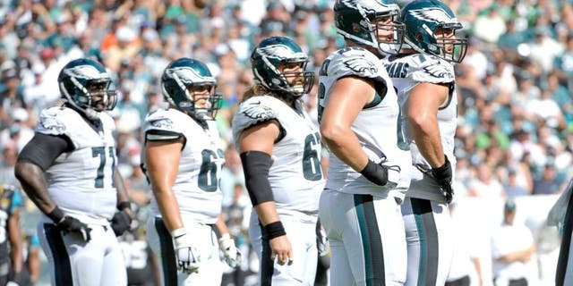 Sep 7, 2014; Philadelphia, PA, USA; Philadelphia Eagles tackle Jason Peters (71), center David Molk (63), center Jason Kelce (62), guard Todd Herremans (79) and tackle Andrew Gardner (66) during game against the Jacksonville Jaguars at Lincoln Financial Field. The Eagles defeated the Jaguars, 34-17. Mandatory Credit: Eric Hartline-USA TODAY Sports