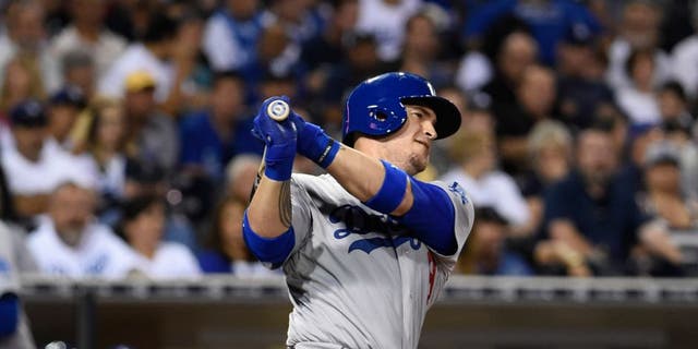 SAN DIEGO, CA - SEPTEMBER 3: Yasmani Grandal #9 of the Los Angeles Dodgers plays during a baseball game against the San Diego Padres at Petco Park September, 3, 2015 in San Diego, California. (Photo by Denis Poroy/Getty Images)