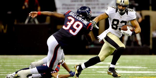 Aug 30, 2015; New Orleans, LA, USA; New Orleans Saints wide receiver Willie Snead (83) escapes from Houston Texans cornerback Kevin Johnson (30) and safety Lonnie Ballentine (39) during the first half of a preseason game at the Mercedes-Benz Superdome. Mandatory Credit: Derick E. Hingle-USA TODAY Sports