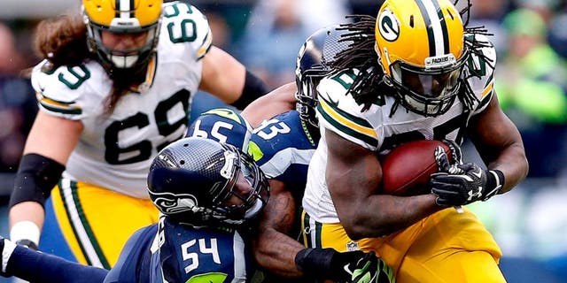 SEATTLE, WA - JANUARY 18: Eddie Lacy #27 of the Green Bay Packers runs the ball in the second half against the Seattle Seahawks during the 2015 NFC Championship game at CenturyLink Field on January 18, 2015 in Seattle, Washington. (Photo by Christian Petersen/Getty Images)