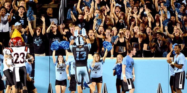 Sep 6, 2014; Chapel Hill, NC, USA;North Carolina Tar Heels receiver Mack Hollins (13) celebrates a touchdown with fans during the second half against the San Diego State Aztecs at Kenan Memorial Stadium. North Carolina won 31-27. Mandatory Credit: Rob Kinnan-USA TODAY Sports