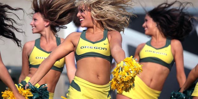 Sep 6, 2014; Eugene, OR, USA; Oregon Ducks cheerleaders preform against the Michigan State Spartans at Autzen Stadium. Mandatory Credit: Scott Olmos-USA TODAY Sports