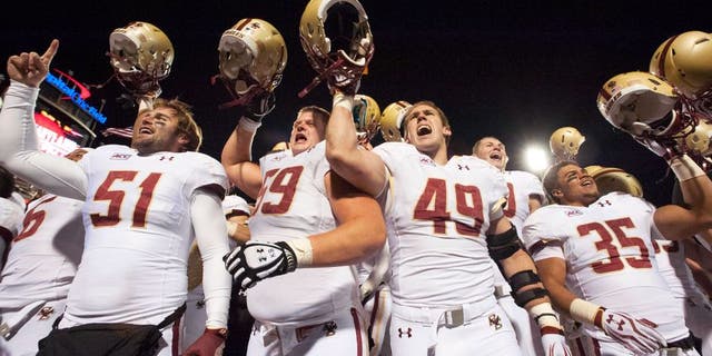 Nov 23, 2013; College Park, MD, USA; Boston College Eagles celebrates with their fans after the game against the Maryland Terrapins at Byrd Stadium. Boston College Eagles defeated Maryland Terrapins 29-26. Mandatory Credit: Tommy Gilligan-USA TODAY Sports