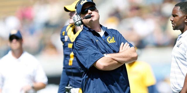 Sep 6, 2014; Berkeley, CA, USA; California Golden Bears head coach Sonny Dykes looks at the scoreboard from the sidelines during the first quarter in a game against the Sacramento State Hornets at Memorial Stadium. Mandatory Credit: Bob Stanton-USA TODAY Sports