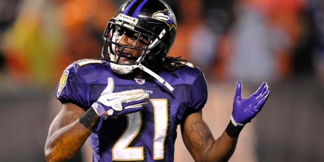 Dec 4, 2011; Cleveland, OH, USA; Baltimore Ravens returner Lardarius Webb (21) celebrates a 68-yard punt return against the Cleveland Browns in the fourth quarter at Cleveland Browns Stadium. Mandatory Credit: David Richard-USA TODAY Sports