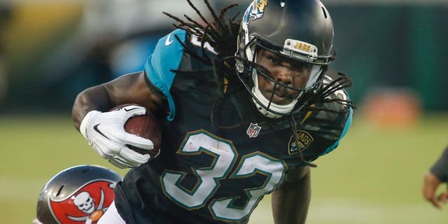 Aug 20, 2016; Jacksonville, FL, USA; Jacksonville Jaguars running back Chris Ivory (33) runs during the first quarter of a football game against the Tampa Bay Buccaneers at EverBank Field. Mandatory Credit: Reinhold Matay-USA TODAY Sports
