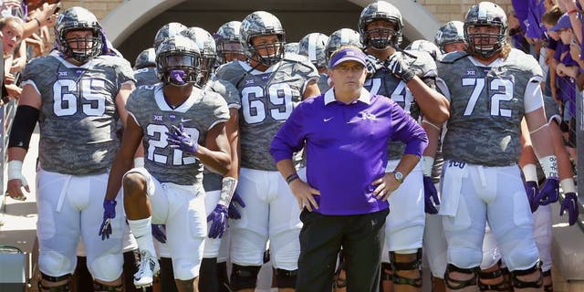 FORT WORTH, TX - SEPTEMBER 12: Head coach Gary Patterson of the TCU Horned Frogs leads his team onto the field to take on the Stephen F. Austin Lumberjacks at Amon G. Carter Stadium on September 12, 2015 in Fort Worth, Texas. (Photo by Tom Pennington/Getty Images)