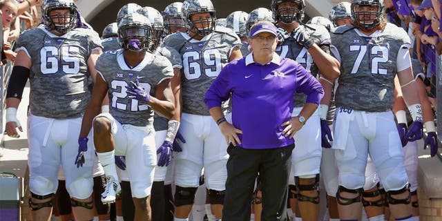 FORT WORTH, TX - SEPTEMBER 12: Head coach Gary Patterson of the TCU Horned Frogs leads his team onto the field to take on the Stephen F. Austin Lumberjacks at Amon G. Carter Stadium on September 12, 2015 in Fort Worth, Texas. (Photo by Tom Pennington/Getty Images)