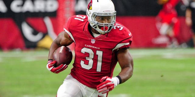 Sep 13, 2015; Glendale, AZ, USA; Arizona Cardinals running back David Johnson (31) carries the ball on a 55 yard touchdown run in the second half against the New Orleans Saints at University of Phoenix Stadium. Mandatory Credit: Matt Kartozian-USA TODAY Sports